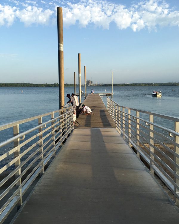 Men fishing on dock