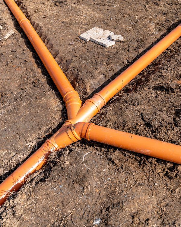 plastic pipe for sewage network in the base plate at the construction site